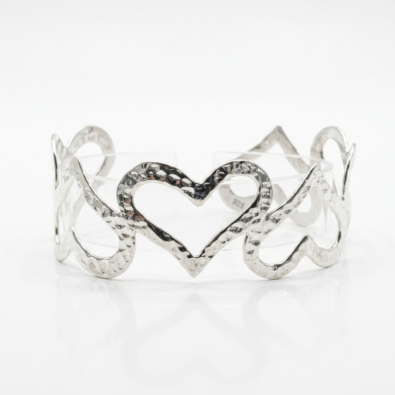 Brazalete Rígido Corazones Entrelazados